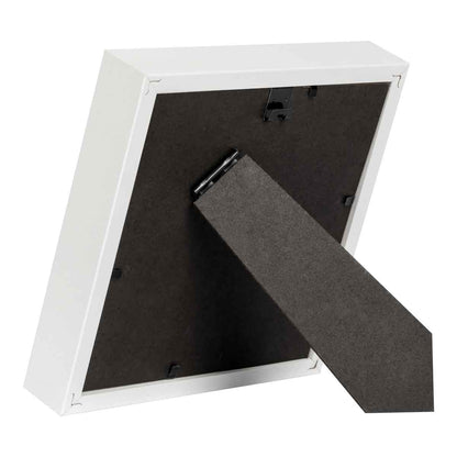 Back of white square frame showing stand.